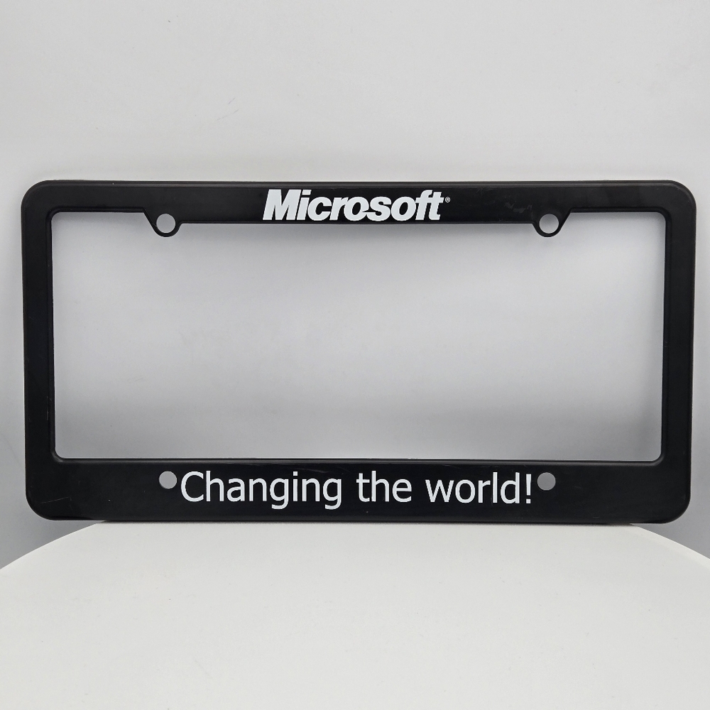 Vintage Microsoft License Plate Frame "Changing the world!"